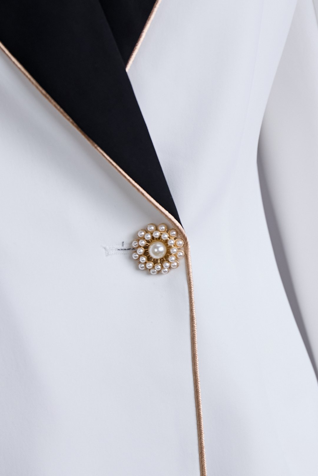 Ludmilla | Elegant Asymmetrical White Blazer with Black Contrast Lapels
